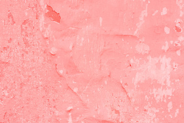Texture, wall, concrete, living coral. It can be used as a background . Wall fragment with scratches and cracks