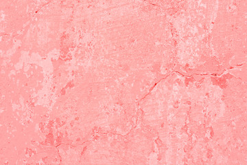 Texture, wall, concrete, living coral. It can be used as a background . Wall fragment with scratches and cracks