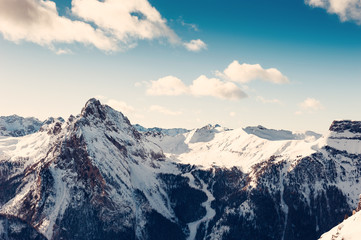 Fototapeta na wymiar Ski resort in winter Dolomite Alps. Val Di Fassa, Italy