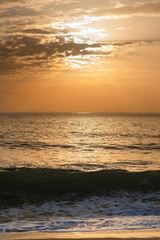 Fototapeta na wymiar Sunset on Atlantic ocean, Nazare, Portugal.