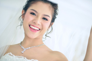 Beutiful bride with wedding dress.