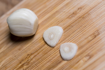 Fototapeta na wymiar Closeup of a sliced garlic glove