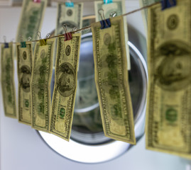 background. defocusing. one hundred dollar bills after washing. offshore money laundering.