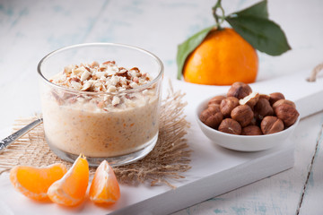 Smoothie of tangerine  and hazelnuts