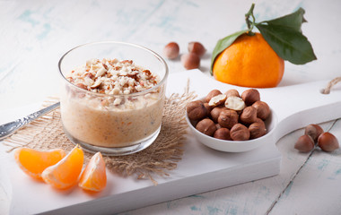   Mandarin smoothies with yogurt and hazelnuts
