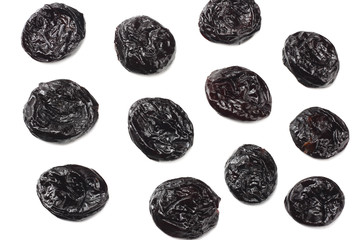 Dried plums - prunes isolated on white background. top view