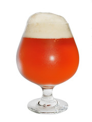 glass with beer and foam on a white background