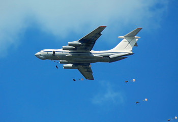 Landing of paratroops from a military transport aircraft