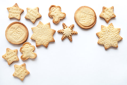 White christmas background with cookies, top view