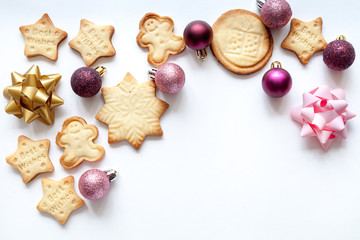 White christmas background with cookies, top view