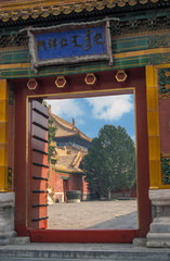 View through an open door at the forbidden city - Beijing, China