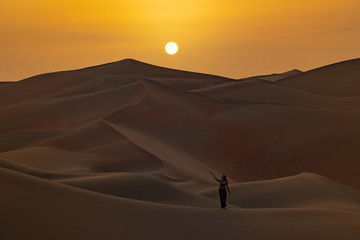 Fototapeta na wymiar Meeting sunrise at Liwa Desert