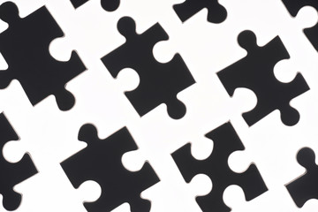 full frame of black and white puzzles backdrop