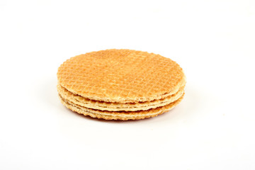 Round ruddy waffle isolated on white background.