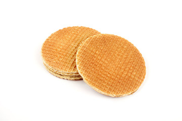 Round ruddy waffle isolated on white background.