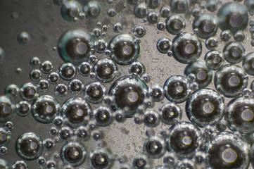 Bubble in liquid background. Macro close up