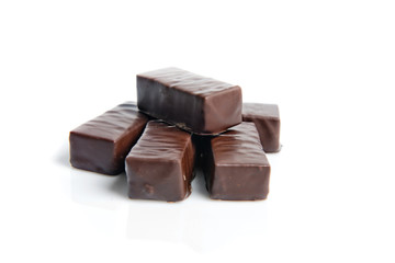 Chocolate candies isolated on white background.