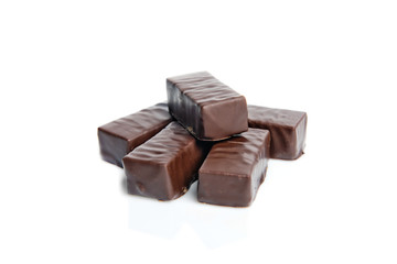 Chocolate candies isolated on white background.