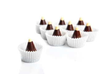 Chocolate candies isolated on white background.