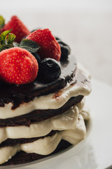 close-up view of gourmet whoopie pie cake with fresh berries