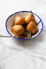 Tea poached pears with anise, cinnamon and other spices