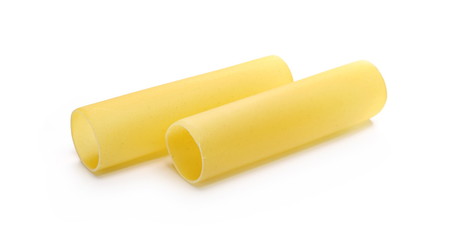 Italian uncooked cannelloni pasta tubes isolated on white background