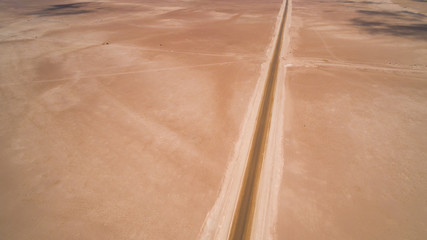 Aerial view from above to lonely Atacama desert route