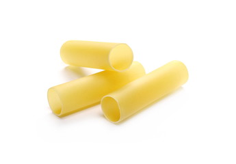 Italian uncooked cannelloni pasta tubes isolated on white background