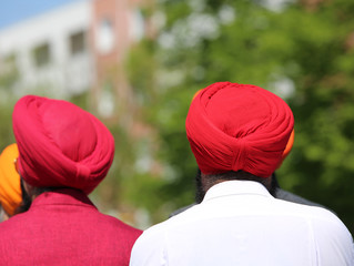 religious Sikh procession with men with turbans