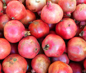 background of many red ripe pomegranate