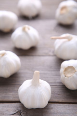 Fresh garlic on a grey wooden background