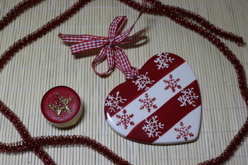  Ceramic heart on a red ribbon with a red bow