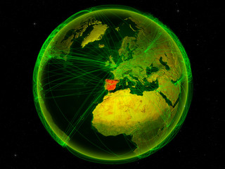 Spain from space on planet Earth with digital network representing international communication, technology and travel.