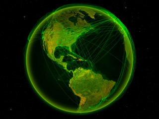 Haiti from space on planet Earth with digital network representing international communication, technology and travel.