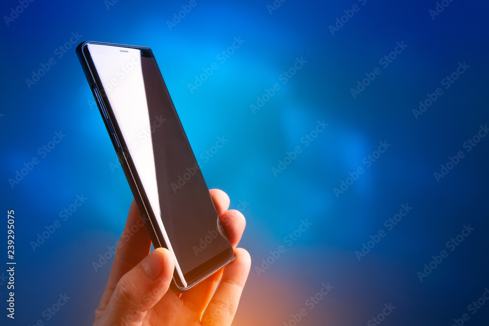 Aufkleber phone in hand. mobile connection. the new generation of mobile communications. phone with a flare.