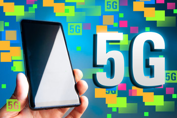 Cellular. 5G. Cellular telephone. 5G broadband network. The fifth generation of mobile communications. Phone in hand. Data transfer rate Communication standard