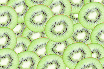Green kiwi slices background.