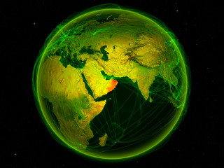 Oman from space on planet Earth with digital network representing international communication, technology and travel.
