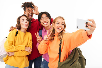 Group of cheerful teenagers isolated