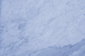 White marble texture for skin tile wallpaper luxurious background Image is tinted in blue.