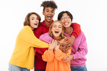 Group of cheerful teenagers isolated