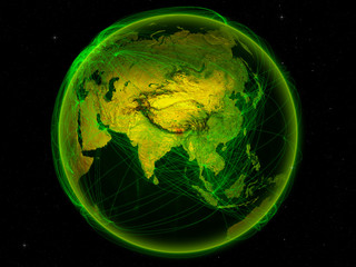 Bhutan from space on planet Earth with digital network representing international communication, technology and travel.
