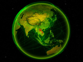 Laos from space on planet Earth with digital network representing international communication, technology and travel.