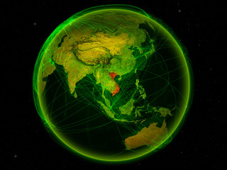 Vietnam from space on planet Earth with digital network representing international communication, technology and travel.