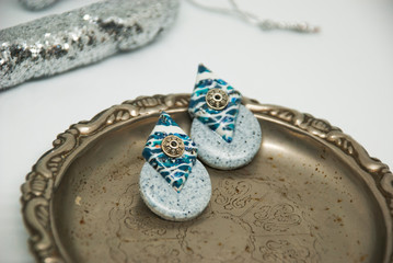 Geometric winter blue and grey earrings with christmas decor. Handmade jewelry of polymer clay.