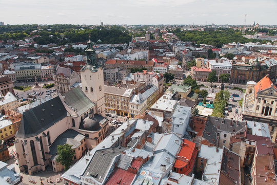 Lviv cityscape and view of the Latin Cathedral - a landmark Roman Catholic Cathedral, dating from the 14th century. Photo of the old roofs of the city of Lviv with the town hall.