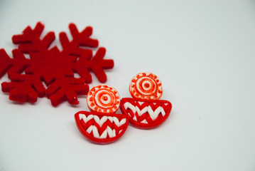 Christmas white and red small stud earrings with xmas decor snowflake. Jewelry of polymer clay.
