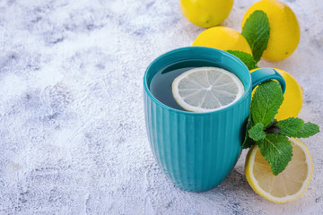 tea with lemon, ginger and mint, copy space