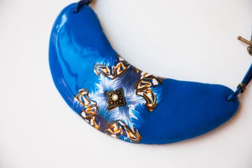 Tuinposter Beautiful fashion handmade blue bib necklace of polymer clay. Ethnic boho style jewelry in macro. © Etnika