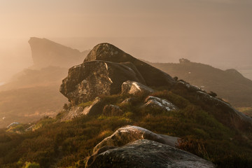 A misty Ramshaw Rocks sunrise at Ramshaw Rocks, Staffordshire in the Peak District National Park.